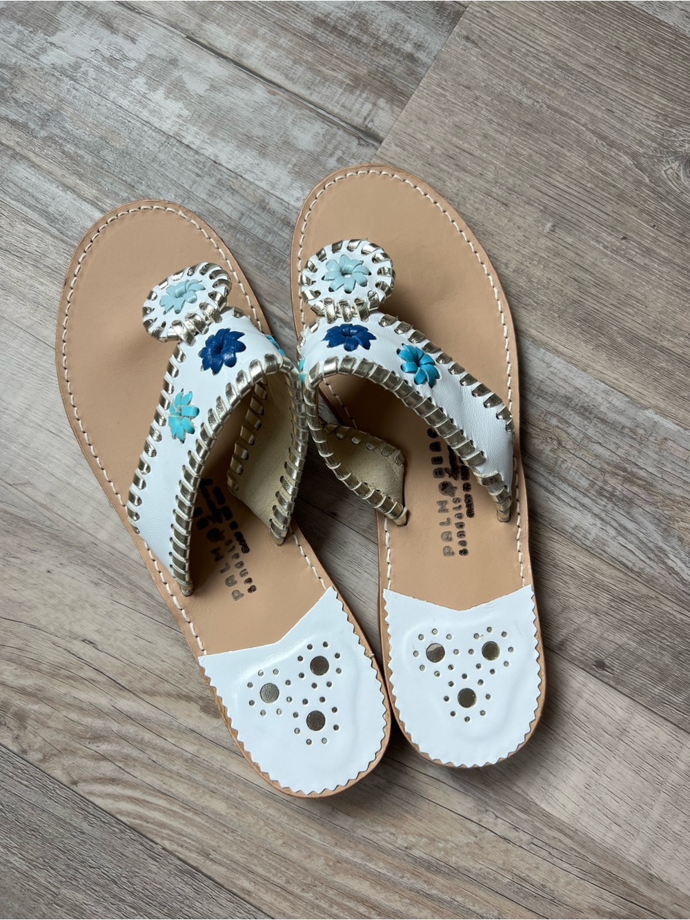 White Floral Leather Thong Sandals with Blue Accents
